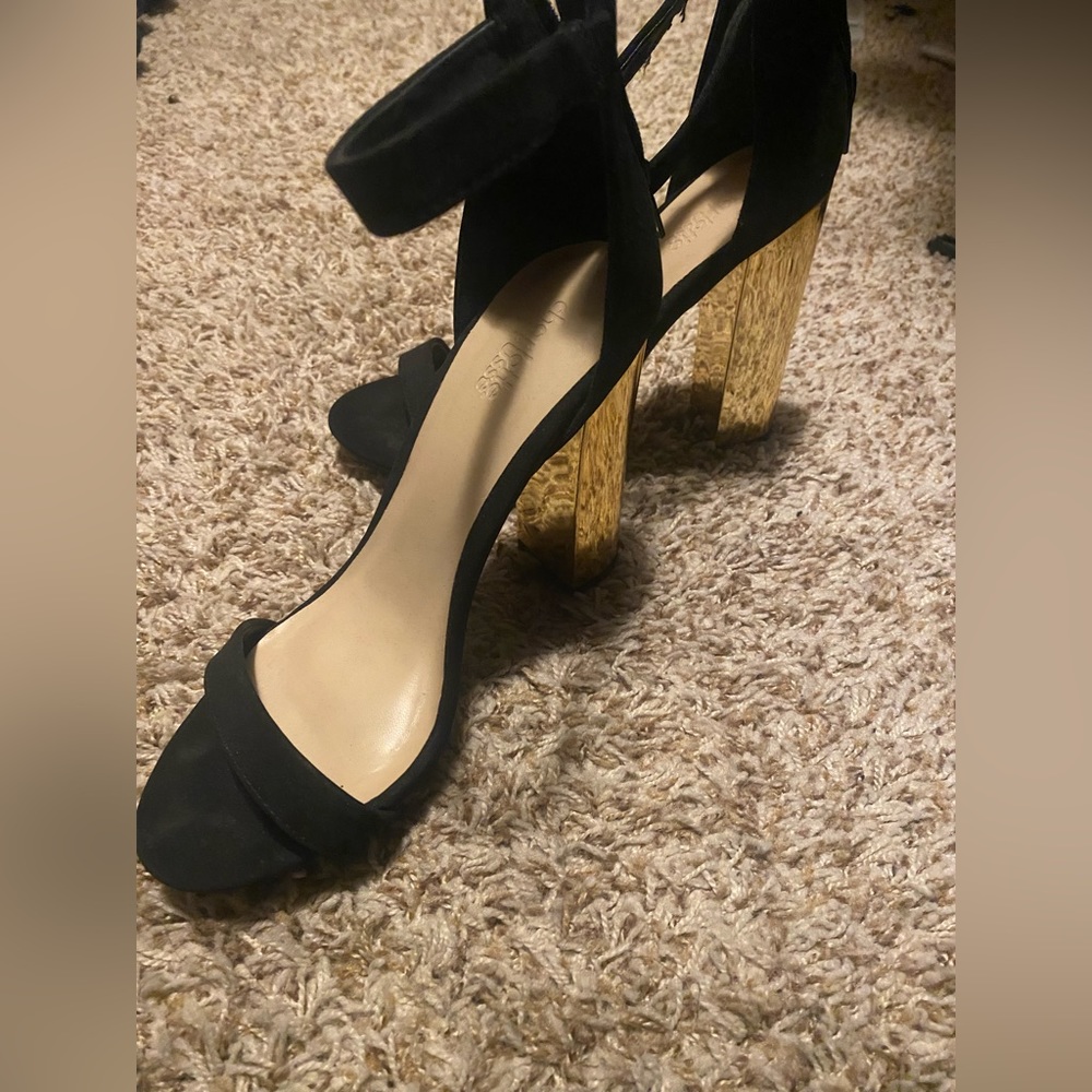 Black and gold heels